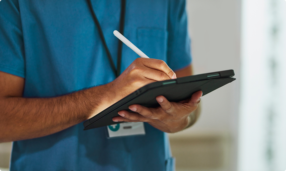Medical worker using tablet